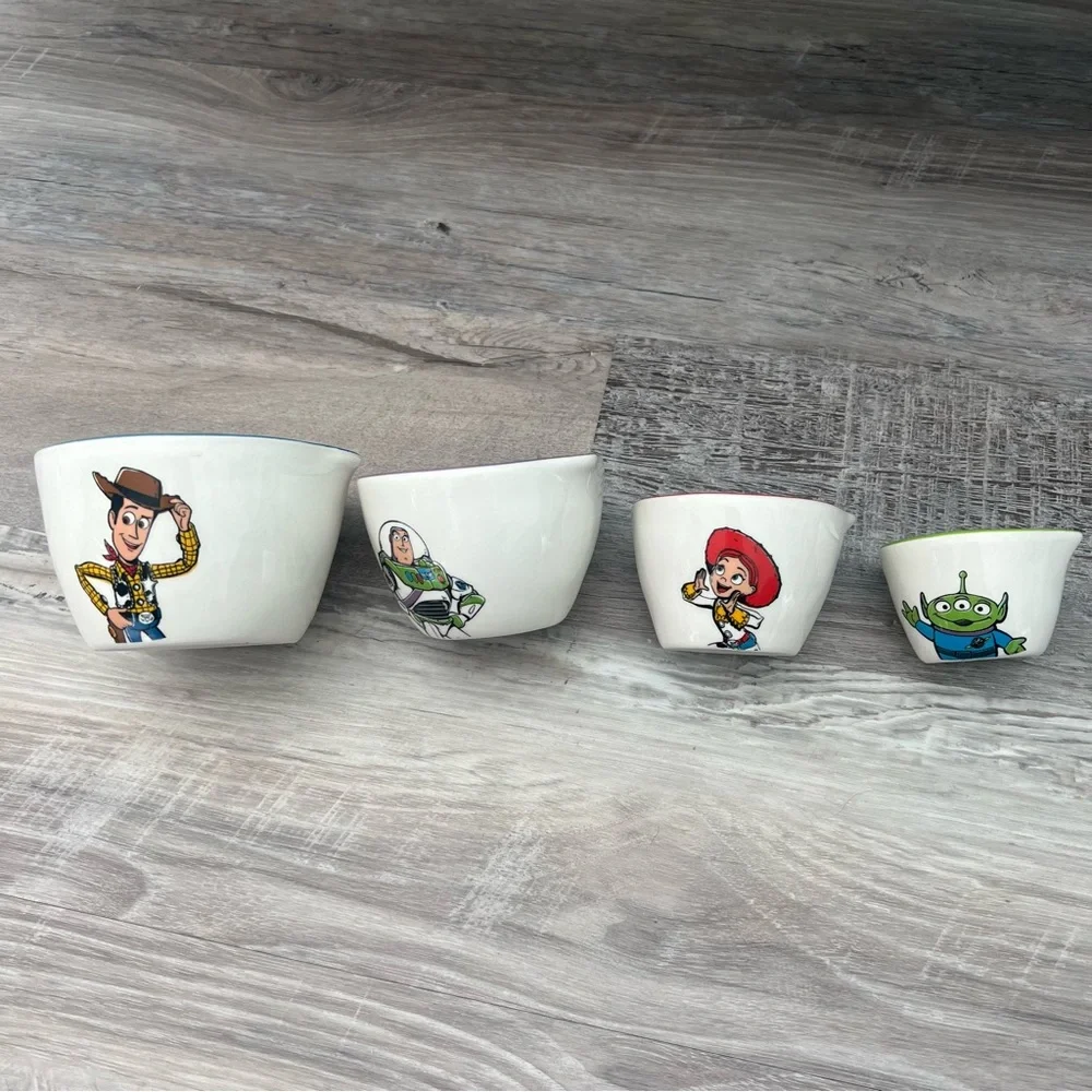 Toy Story Rae Dunn Disney Measuring Cups NWT Set of 4 and Buzz Lightyear Mug